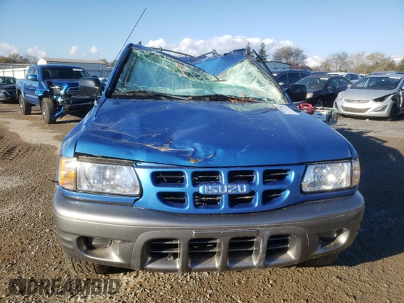 2001 Isuzu Rodeo S with VIN 4S2DM58WX14301336, listed as a Copart auction lot 77770164 with Not provided miles and Salvage title. Bid and sale history available at DreamBid. Image 5.