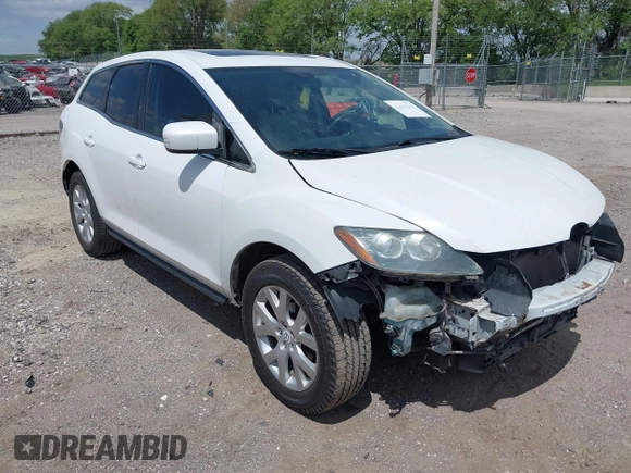 2007 Mazda CX-7 Sport z VIN JM3ER293170143125, wystawiony jako IAAI lot #42293211 z przebiegiem 163 434 mil mil oraz . Historia ofert i sprzedaży dostępna na DreamBid. Obrazek 1.