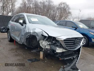2021 Mazda CX-9 Touring with VIN JM3TCBCY2M0507027, listed as a IAAI auction lot 41079723 with 61,387 mi miles. Bid and sale history available at carsss.com. Image 1.