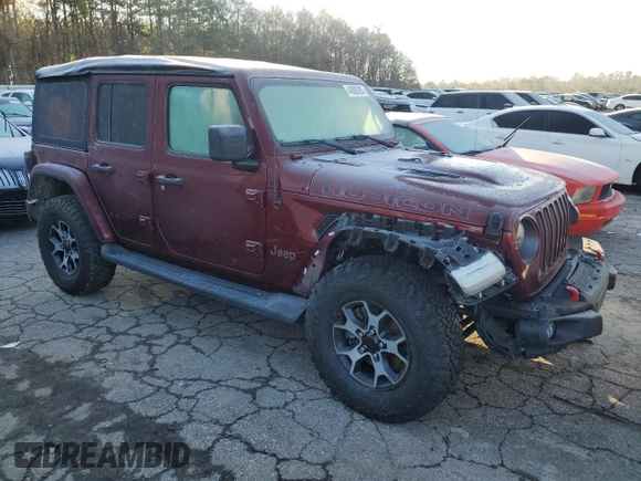 2021 Jeep Wrangler Unlimited Rubicon with VIN 1C4HJXFN7MW576196, listed as a Copart auction lot 44806285 with 47,312 mi miles and Salvage Title. Bid and sale history available at DreamBid. Image 4.