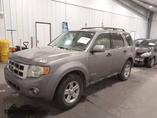 2008 Ford Escape Hybrid with VIN 1FMCU59H18KC30939, listed as a IAAI auction lot 41575587 with 208,879 mi miles. Bid and sale history available at carsss.com. Image 2.