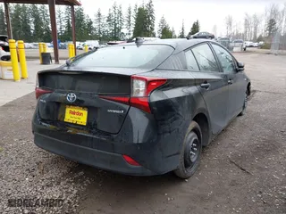 2020 Toyota Prius L Eco with VIN JTDKARFUXL3115471, listed as a IAAI auction lot 41831411 with 48,378 mi miles. Bid and sale history available at carsss.com. Image 4.
