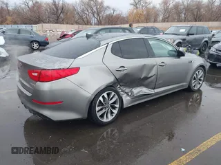 2015 Kia Optima SX Turbo with VIN 5XXGR4A66FG361755, listed as a IAAI auction lot 41199887 with 114,179 mi miles. Bid and sale history available at carsss.com. Image 4.