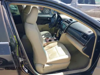 2014 Toyota Camry L with VIN 4T4BF1FK3ER413537, listed as a IAAI auction lot 42015577 with 181,592 mi miles. Bid and sale history available at carsss.com. Image 5.