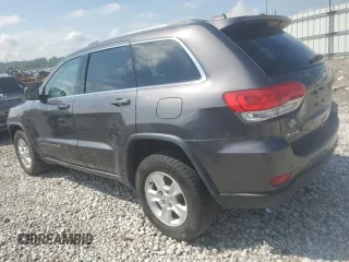 2017 Jeep Grand Cherokee Altitude with VIN 1C4RJFAG6HC889710, listed as a Copart auction lot 63336995 with 243,432 mi miles and Clean title. Bid and sale history available at DreamBid. Image 2.