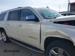 2015 Chevrolet Suburban LTZ with VIN 1GNSCKKC2FR741040, listed as a IAAI auction lot 41709574 with 87,795 mi miles and . Bid and sale history available at DreamBid. Image 13.