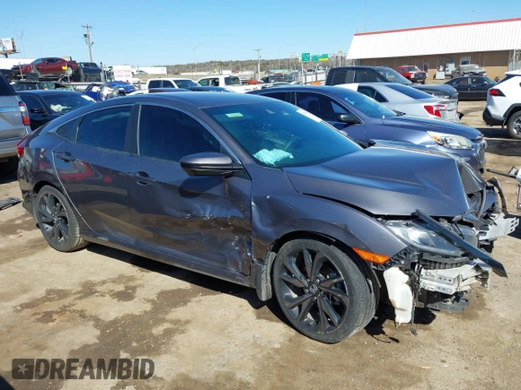 2019 Honda Civic Sport with VIN 19XFC2F82KE019704, listed as a IAAI auction lot 41770051 with 90,011 mi miles and . Bid and sale history available at DreamBid. Image 13.