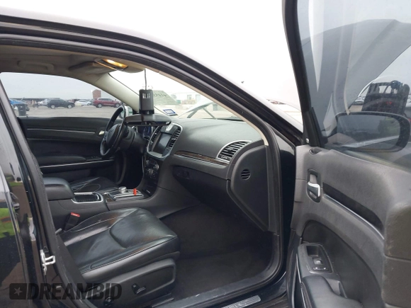 2016 Chrysler 300 with VIN 2C3CCAEG5GH333935, listed as a IAAI auction lot 41433834 with 131,524 mi miles. Bid and sale history available at carsss.com. Image 5.