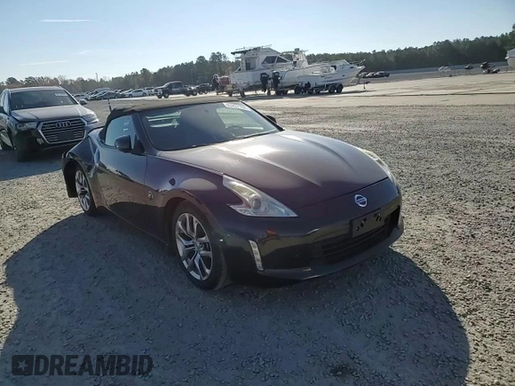 2014 Nissan 370Z Touring with VIN JN1AZ4FH3EM620195, listed as a Copart auction lot 83207104 with 66,974 mi miles and Salvage Title. Bid and sale history available at DreamBid. Image 10.