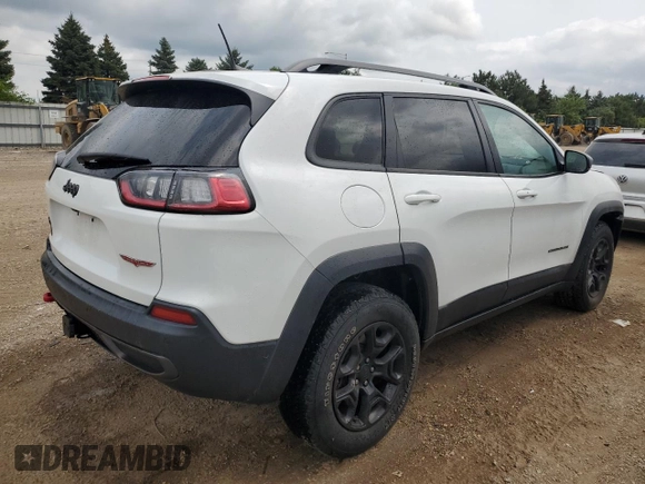 2019 Jeep Cherokee Trailhawk Elite with VIN 1C4PJMBX7KD140720, listed as a Copart auction lot 64268064 with 61,747 mi miles and Salvage Title. Bid and sale history available at carsss.com. Image 3.