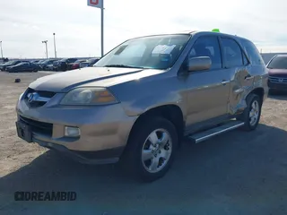 2004 Acura MDX with VIN 2HNYD18294H532989, listed as a IAAI auction lot 41357046 with 174,685 mi miles. Bid and sale history available at carsss.com. Image 2.