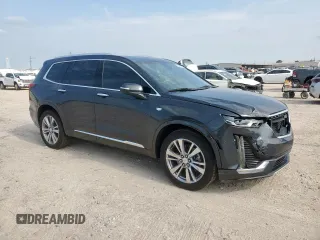 2022 Cadillac XT6 Premium Luxury z VIN 1GYKPCRS1NZ104567, wystawiony jako Copart lot #58211505 z przebiegiem 54 541 mil mil oraz Tytuł czysty. Historia ofert i sprzedaży dostępna na DreamBid. Obrazek 4.