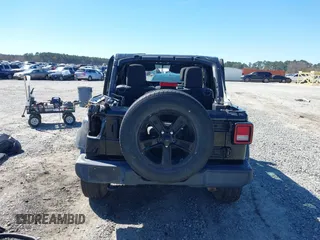 2021 Jeep Wrangler Unlimited Sport S с VIN 1C4HJXDG4MW753159, выставлен на аукционе IAAI как лот 41723515 с пробегом 86 589 миль миль и . История ставок и продаж доступна на DreamBid. Изображение 17.