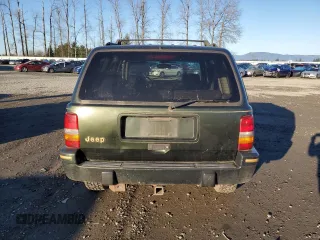 1995 Jeep Grand Cherokee Limited with VIN 1J4GZ78S7SC613568, listed as a Copart auction lot 83365584 with 184,099 mi miles and Salvage Title. Bid and sale history available at carsss.com. Image 6.