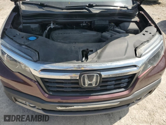 2019 Honda Ridgeline RTL-E with VIN 5FPYK3F71KB002046, listed as a Copart auction lot 61934455 with 131,674 mi miles and Salvage title. Bid and sale history available at DreamBid. Image 11.