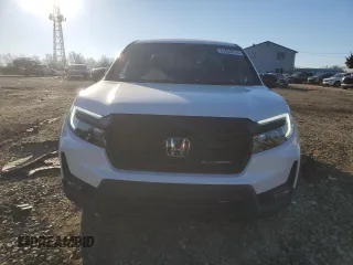 2023 Honda Ridgeline Black Edition with VIN 5FPYK3F82PB055208, listed as a Copart auction lot 87029914 with 33,687 mi miles and Salvage title. Bid and sale history available at DreamBid. Image 5.