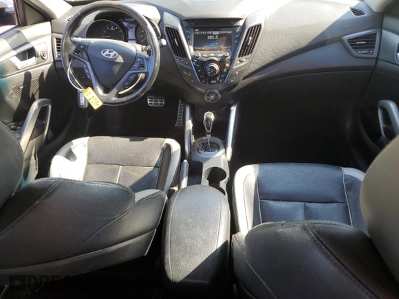 2013 Hyundai Veloster Turbo z VIN KMHTC6AE5DU178613, wystawiony jako Copart lot #58416925 z przebiegiem 173 650 mil mil oraz Szkoda całkowita • Salvage title. Historia ofert i sprzedaży dostępna na DreamBid. Obrazek 8.