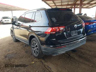 2018 Volkswagen Tiguan SEL z VIN 3VV3B7AX1JM036551, wystawiony jako IAAI lot #42170151 z przebiegiem 97 506 mil mil oraz . Historia ofert i sprzedaży dostępna na DreamBid. Obrazek 3.