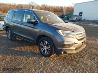 2017 Honda Pilot EX-L with VIN 5FNYF5H56HB020703, listed as a IAAI auction lot 41366342 with 96,618 mi miles. Bid and sale history available at carsss.com. Image 1.