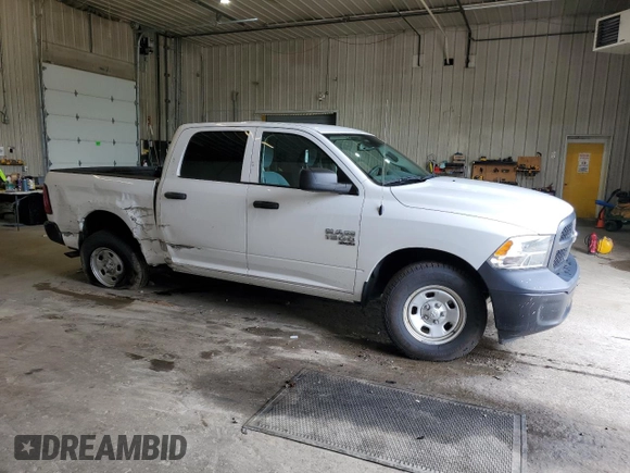 2019 Ram 1500 Tradesman with VIN 3C6RR7KG9KG628094, listed as a Copart auction lot 55074074 with 82,029 mi miles and Salvage title. Bid and sale history available at DreamBid. Image 4.