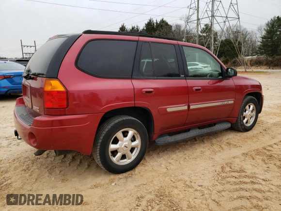 2004 GMC Envoy SLT with VIN 1GKDT13S342262833, listed as a Copart auction lot 87828975 with 203,404 mi miles and Salvage Title. Bid and sale history available at carsss.com. Image 3.