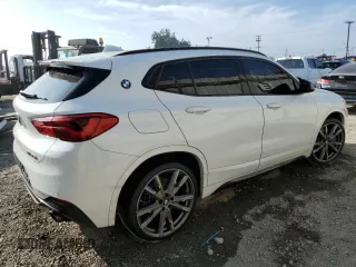 2019 BMW X2 M35i z VIN WBXYN1C56KEF29692, wystawiony jako Copart lot #75557284 z przebiegiem 62 186 mil mil oraz Szkoda całkowita • Salvage title. Historia ofert i sprzedaży dostępna na DreamBid. Obrazek 3.