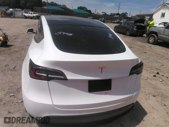 2022 Tesla Model Y Long Range z VIN 7SAYGDEE3NF385933, wystawiony jako IAAI lot #42059675 z przebiegiem 88 488 mil mil oraz . Historia ofert i sprzedaży dostępna na DreamBid. Obrazek 15.