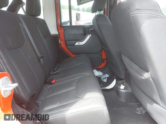 2015 Jeep Wrangler Unlimited Rubicon z VIN 1C4BJWFG4FL598033, wystawiony jako IAAI lot #42435523 z przebiegiem 134 202 mil mil oraz . Historia ofert i sprzedaży dostępna na DreamBid. Obrazek 8.