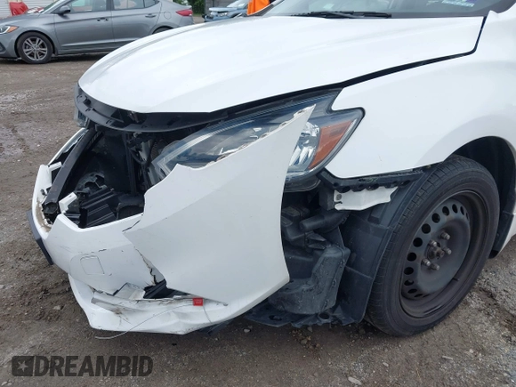 2017 Nissan Sentra S z VIN 3N1AB7AP7HY409457, wystawiony jako IAAI lot #42388313 z przebiegiem 126 553 mil mil oraz . Historia ofert i sprzedaży dostępna na DreamBid. Obrazek 6.