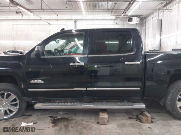 2015 Chevrolet Silverado 1500 High Country with VIN 3GCUKTEJXFG290752, listed as a IAAI auction lot 41412988 with 160,000 mi miles. Bid and sale history available at carsss.com. Image 15.