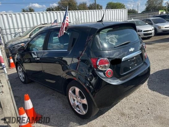 2012 Chevrolet Sonic LTZ z VIN 1G1JE6SH5C4133693, wystawiony jako Copart lot #45226865 z przebiegiem 142 151 mil mil oraz Czysty tytuł • Clean title. Historia ofert i sprzedaży dostępna na DreamBid. Obrazek 3.