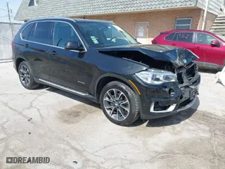2015 BMW X5 xDrive35i with VIN 5UXKR0C58F0P03004, listed as a IAAI auction lot 41774875 with 140,645 mi miles. Bid and sale history available at carsss.com. Image 1.