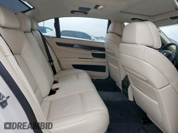 2011 BMW 7 Series 750Li with VIN WBAKB8C58BCY65645, listed as a Copart auction lot 57612775 with 69,670 mi miles and Salvage title. Bid and sale history available at DreamBid. Image 10.