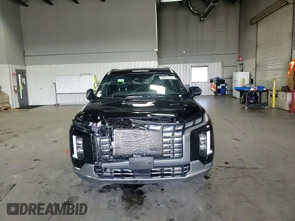 2023 Hyundai Palisade Calligraphy z VIN KM8R7DGE6PU556680, wystawiony jako Copart lot #53627735 z przebiegiem 59 116 mil mil oraz Szkoda całkowita • Salvage title. Historia ofert i sprzedaży dostępna na DreamBid. Obrazek 11.