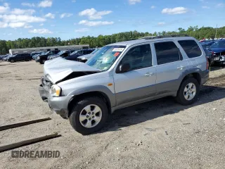2001 Mazda Tribute LX with VIN 4F2CU08141KM65160, listed as a Copart auction lot 60895624 with 255,194 mi miles and Salvage Title. Bid and sale history available at carsss.com. Image 1.
