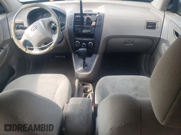 2005 Hyundai Tucson GL with VIN KM8JM12BX5U075930, listed as a Copart auction lot 67500484 with 141,028 mi miles and Salvage Title. Bid and sale history available at carsss.com. Image 8.