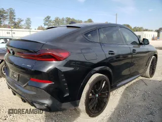 2022 BMW X6 xDrive40i z VIN 5UXCY6C08N9L22942, wystawiony jako Copart lot #64176732 z przebiegiem 21 538 mil mil oraz . Historia ofert i sprzedaży dostępna na DreamBid. Obrazek 4.