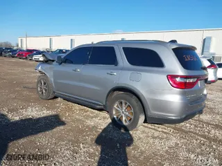 2014 Dodge Durango Limited with VIN 1C4SDJDT7EC349198, listed as a IAAI auction lot 40811926 with 258,652 mi miles. Bid and sale history available at carsss.com. Image 3.