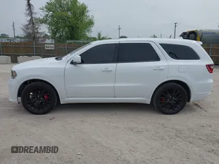 2017 Dodge Durango R/T with VIN 1C4SDJCT5HC861063, listed as a IAAI auction lot 42504678 with 107,705 mi miles and . Bid and sale history available at DreamBid. Image 14.