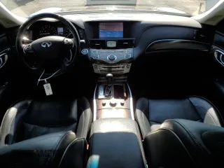 2016 Infiniti Q70 with VIN JN1BY1PR3GM720975, listed as a Copart auction lot 62496665 with 100,250 mi miles and Salvage title. Bid and sale history available at DreamBid. Image 8.
