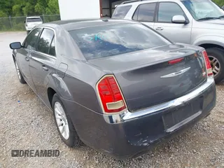 2013 Chrysler 300 with VIN 2C3CCAAG4DH588190, listed as a IAAI auction lot 42476895 with 224,837 mi miles and . Bid and sale history available at DreamBid. Image 3.