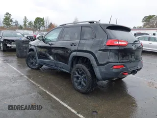 2016 Jeep Cherokee Trailhawk with VIN 1C4PJMBS5GW304062, listed as a IAAI auction lot 41756813 with 112,671 mi miles. Bid and sale history available at carsss.com. Image 3.