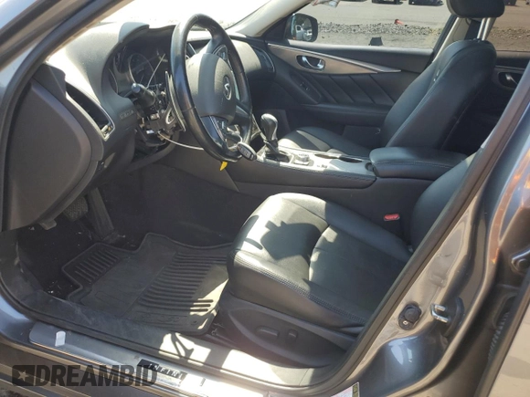 2014 Infiniti Q50 Premium z VIN JN1BV7AR1EM693471, wystawiony jako Copart lot #58991305 z przebiegiem 144 323 mil mil oraz Szkoda całkowita • Salvage title. Historia ofert i sprzedaży dostępna na DreamBid. Obrazek 7.