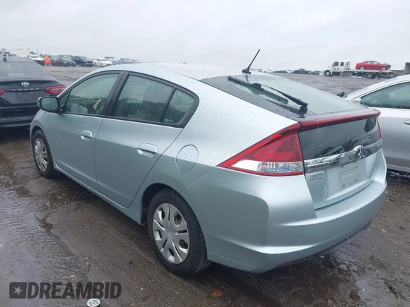 2012 Honda Insight LX z VIN JHMZE2H54CS002149, wystawiony jako IAAI lot #42237680 z przebiegiem 144 826 mil mil oraz . Historia ofert i sprzedaży dostępna na DreamBid. Obrazek 3.
