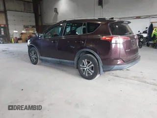 2016 Toyota RAV4 LE with VIN 2T3BFREV3GW430479, listed as a IAAI auction lot 40501022 with 126,835 mi miles. Bid and sale history available at carsss.com. Image 3.