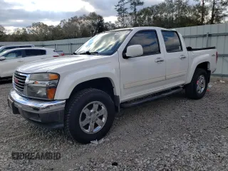 2011 GMC Canyon z VIN 1GTH5NFEXB8114287, wystawiony jako Copart lot #82394454 z przebiegiem 116 860 mil mil oraz Szkody całkowita. Historia ofert i sprzedaży dostępna na DreamBid. Obrazek 1.