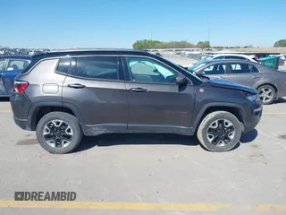 2019 Jeep Compass Trailhawk with VIN 3C4NJDDB0KT619337, listed as a IAAI auction lot 42171160 with 63,869 mi miles and . Bid and sale history available at DreamBid. Image 13.