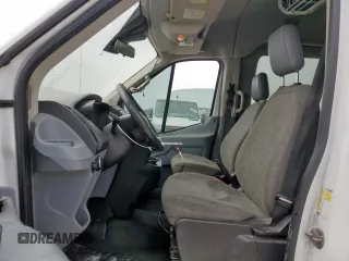 2015 Ford Transit XL with VIN 1FBAX2CM6FKA52776, listed as a Copart auction lot 56257115 with 270,005 mi miles and Salvage title. Bid and sale history available at DreamBid. Image 7.