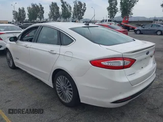 2013 Ford Fusion Titanium Hybrid with VIN 3FA6P0RUXDR386675, listed as a IAAI auction lot 42013986 with 89,349 mi miles. Bid and sale history available at carsss.com. Image 3.