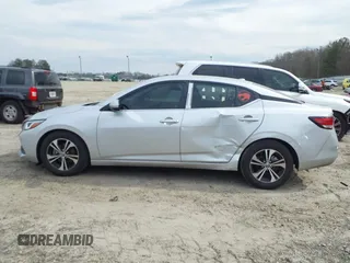 2022 Nissan Sentra SV z VIN 3N1AB8CVXNY315828, wystawiony jako IAAI lot #41688547 z przebiegiem 45 412 mil mil oraz . Historia ofert i sprzedaży dostępna na DreamBid. Obrazek 14.